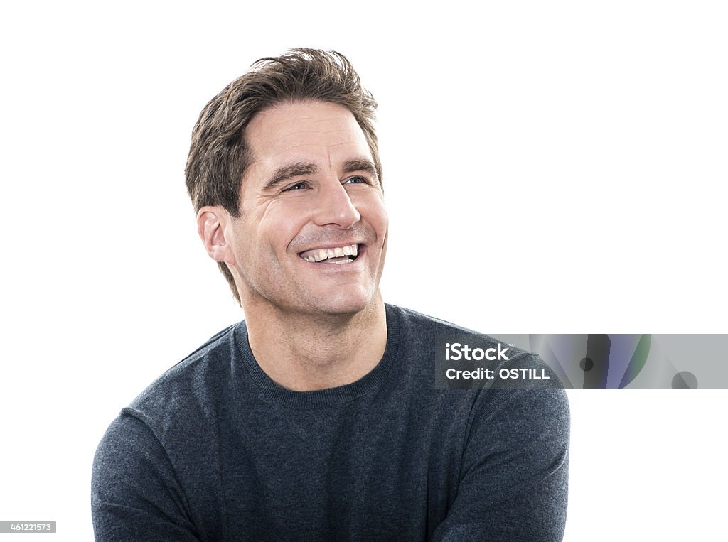 Portrait of a smiling handsome man in a dark t-shirt one caucasian man mature handsome man laughing portrait studio white background Mature Men Stock Photo