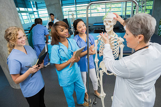 istock Nursing or medical students with instructor in lab classroom 461222957