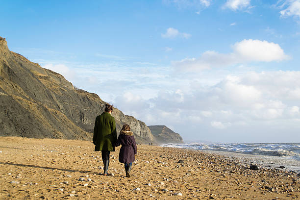 istock Mother and child walking 461224555