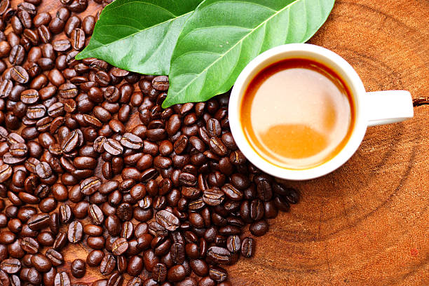 istock Coffee beans on the wooden background. 461230269