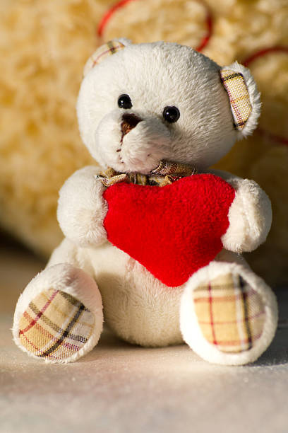 istock Holiday Teddy Bear and Christmas Gift 461231447