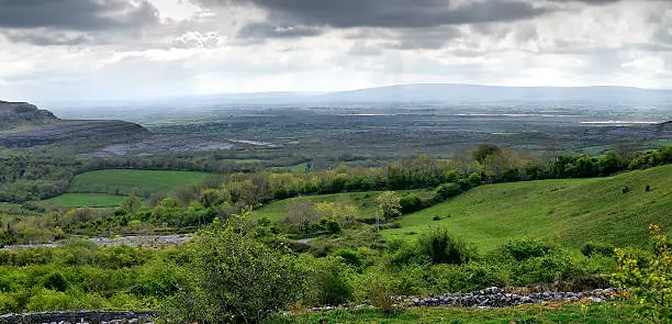 The Burren is a karst-landscape region or alvar in northwest County Clare, in Ireland. Spring season. This photo is composed from 2 separate shots