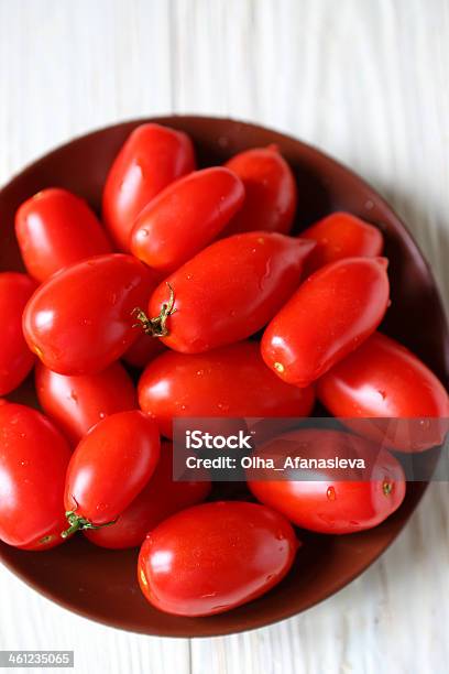 Ripe Red Tomatoes On A Ceramic Platter Stock Photo - Download Image Now - Bowl, Choice, Close-up
