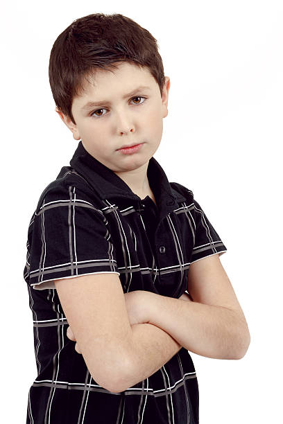 istock pensive young boy isolated on white background 461235431