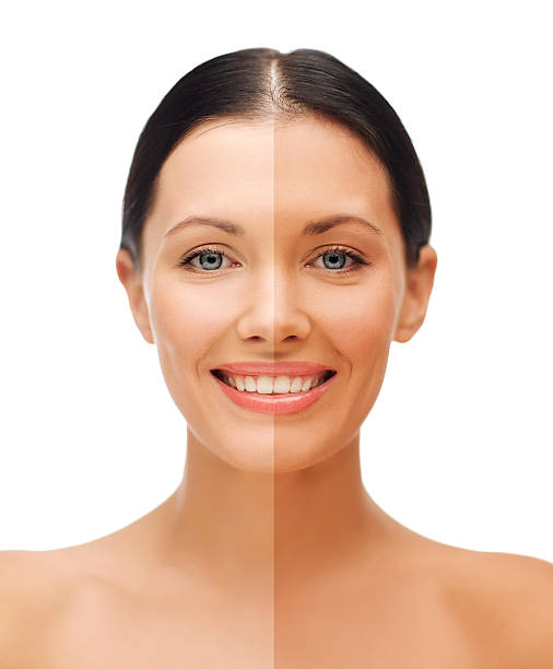 istock beautiful woman with half face tanned 461235963