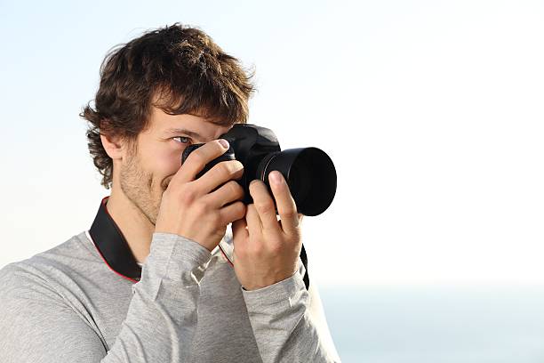 istock Attractive photograph photographing with a slr camera 461236265