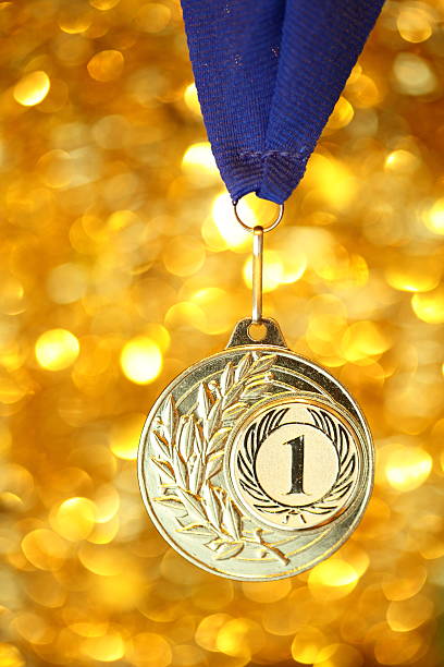istock golden medal on shiny background 461236845