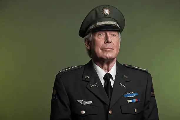 Military general in uniform. Studio portrait.