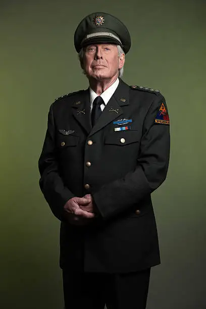 Military general in uniform. Studio portrait.