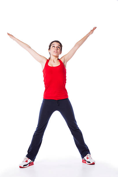 istock Young woman exercising 461249319