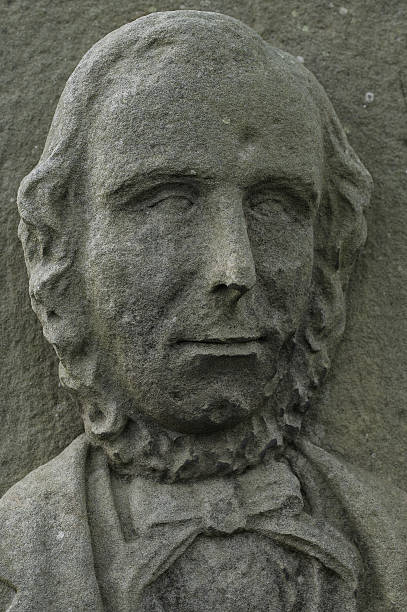 istock Face of an 18th century English lord engraved on stone 461253473