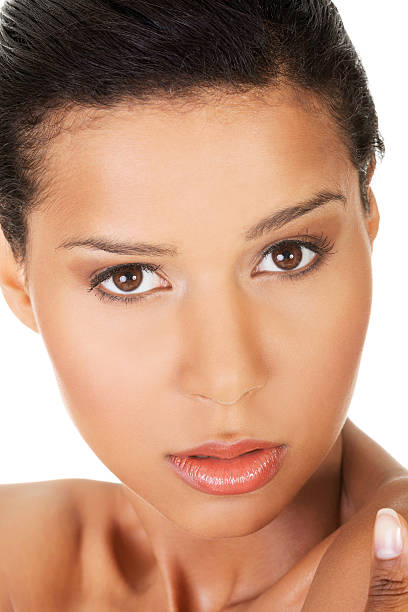 istock Beautiful and young woman's face in a closeup. 461260923
