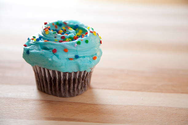 istock Cupcakes with frosting and sprinkles 461266771
