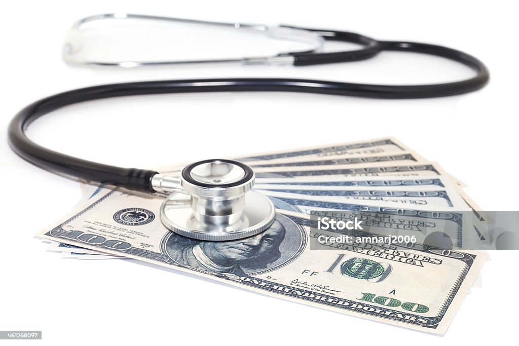 Stethoscope and dollars Stethoscope and dollars for healthcare Business Stock Photo