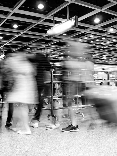 istock black and white passenger walk at subway station 461272397