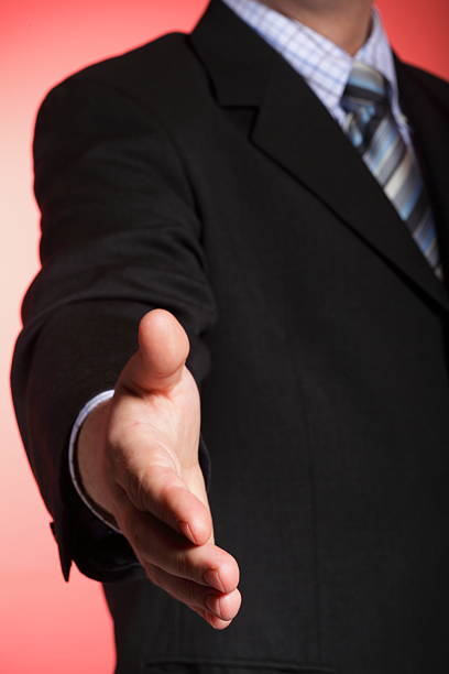 istock business man open hand ready to seal a deal 461280043
