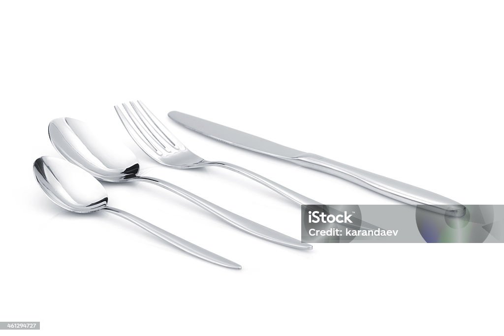 Silverware or flatware set of fork, spoons and knife Silverware or flatware set of fork, spoons and knife. Isolated on white background Clean Stock Photo