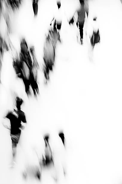 istock A blurred black and white image of people in a public place 461298225