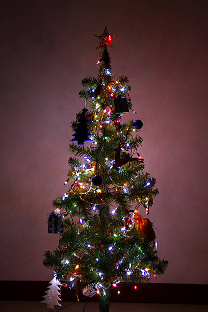 istock Christmas scene with tree gifts and fire 461299301
