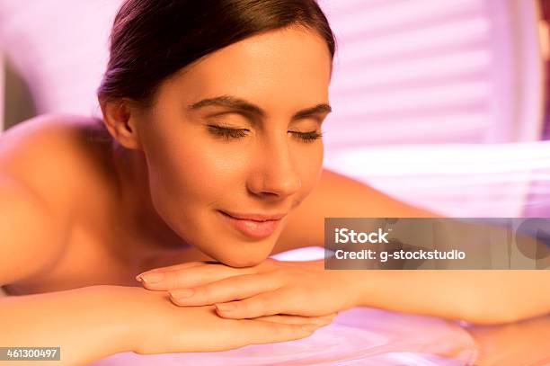 Young Woman In A Solarium Stock Photo - Download Image Now - Tanning Bed, Adult, Adults Only