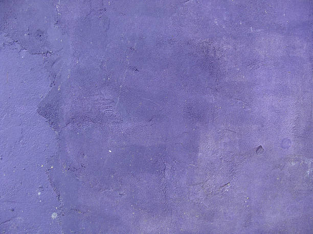 istock dirty old worn concrete wall painted purple 461300671