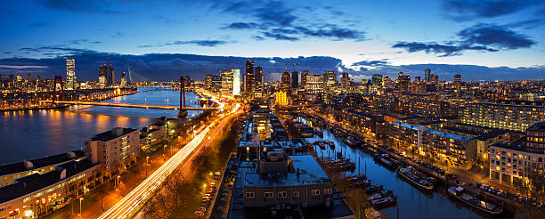 Rotterdam night skyline Beautiful aerial view of the skyline of Rotterdam, the Netherlands, at twilight desiderius erasmus stock pictures, royalty-free photos & images