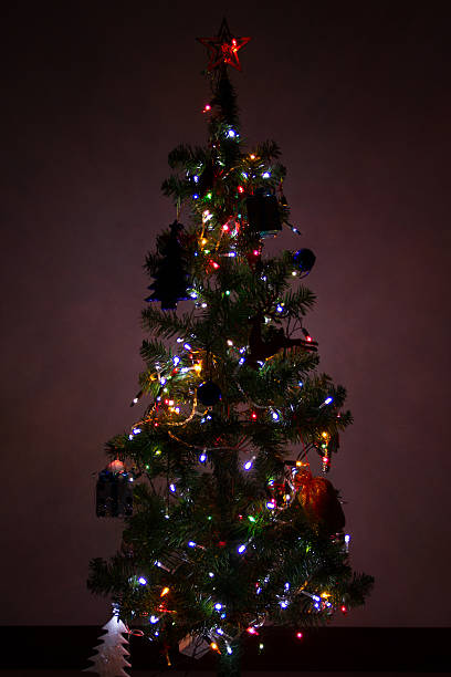 istock Christmas scene with tree gifts and fire 461302127