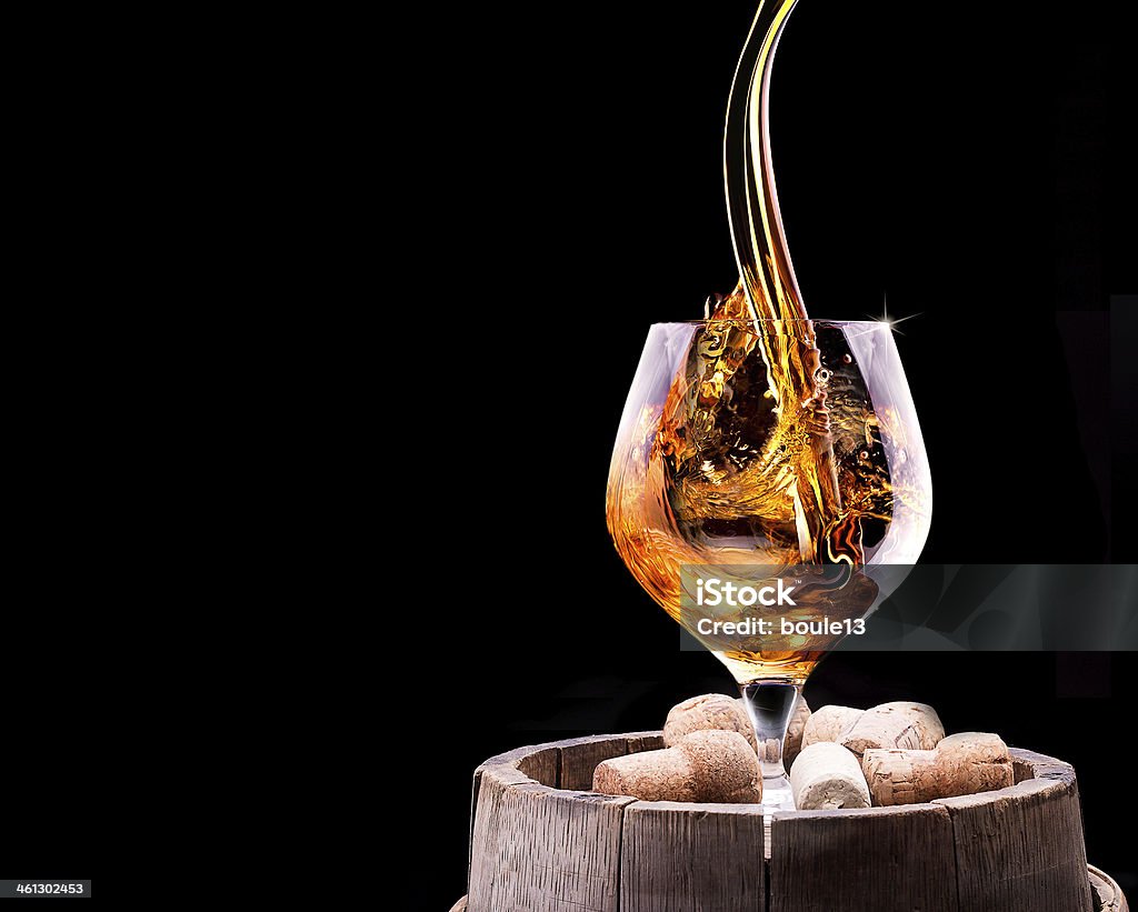 Cognac ou d'un verre de Cognac dans un noir - Photo de Alcool libre de droits