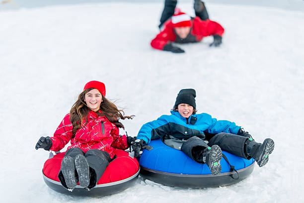 istock Family Fun in the Winter Snow 461304125