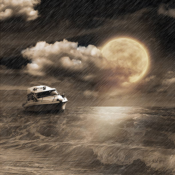 istock Boat in storm  evening on ocean and the moon 461310997