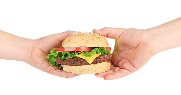 istock French baguette sandwich in hand. 461313917