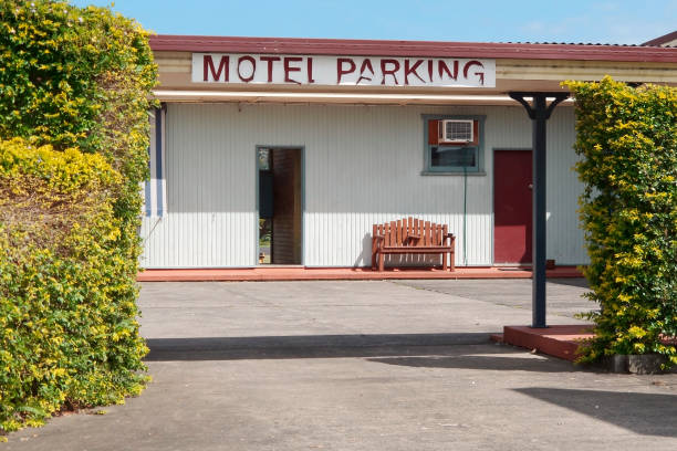 istock Decaying Motel Parking sign. 461314663