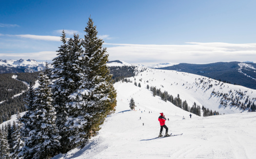 Wanaka, New Zealand – June 17, 2021: A Powder Skiing New Zealand with snow spray