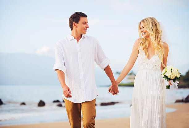 istock Bride and Groom, Romantic Newly Married Couple Holding Hands 461316709