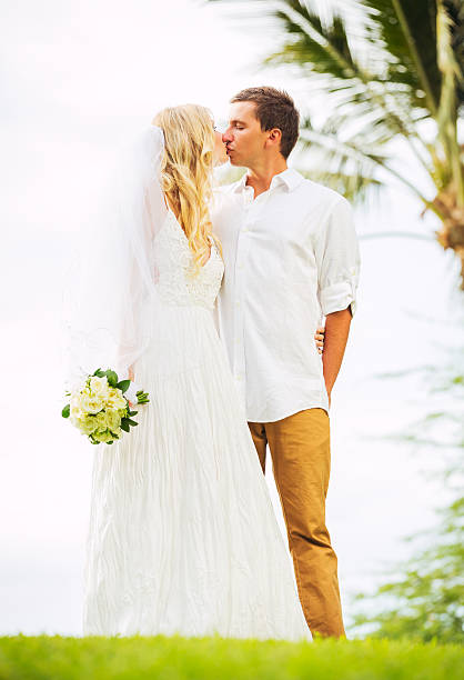 istock Bride and Groom, Romantic Newly Married Couple Holding Hands 461316847