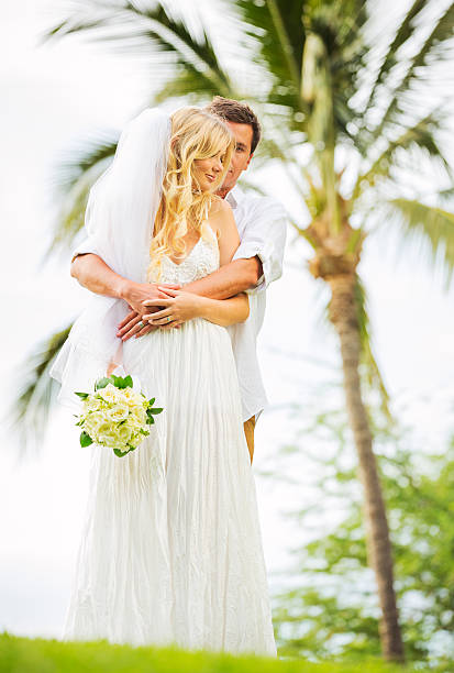 istock Bride and Groom, Romantic Newly Married Couple Holding Hands 461316917