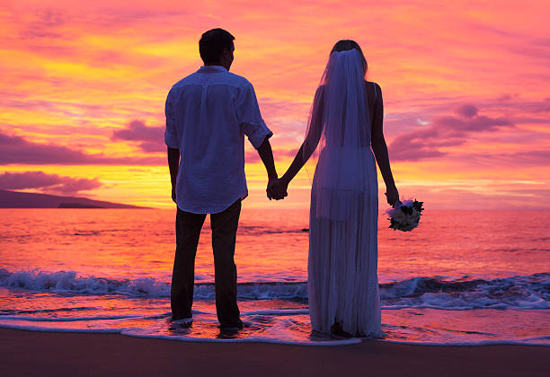 istock Bride and Groom, Enjoying Amazing Sunset 461318927