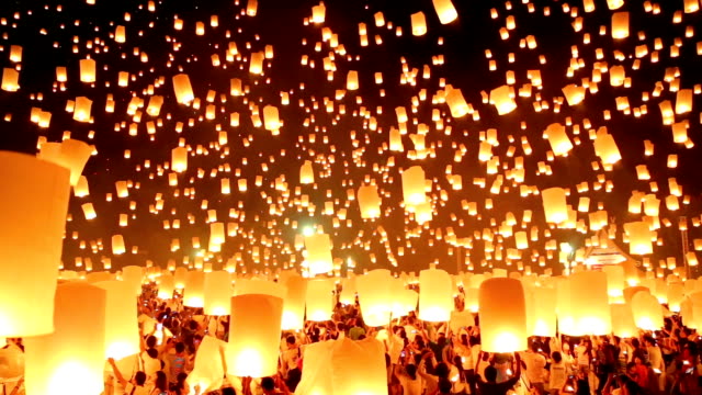 Flying paper lanterns in Loi Kra Tong festival.