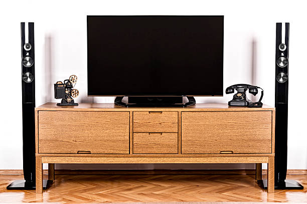 istock television and telephone with home theater 461757445