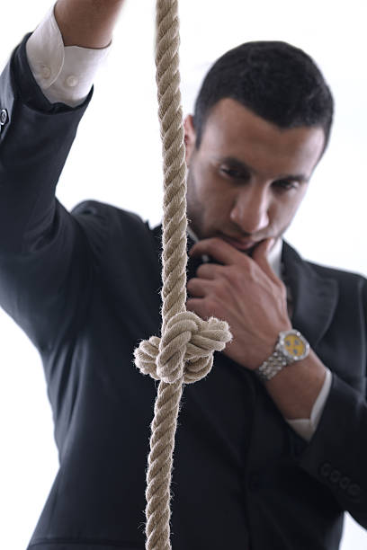 istock business man with rope isolated on white background 461763415