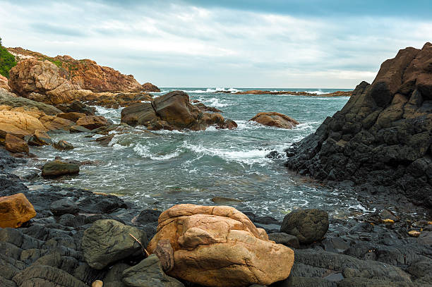 istock The rocky seacoast cut up by waves 461765003