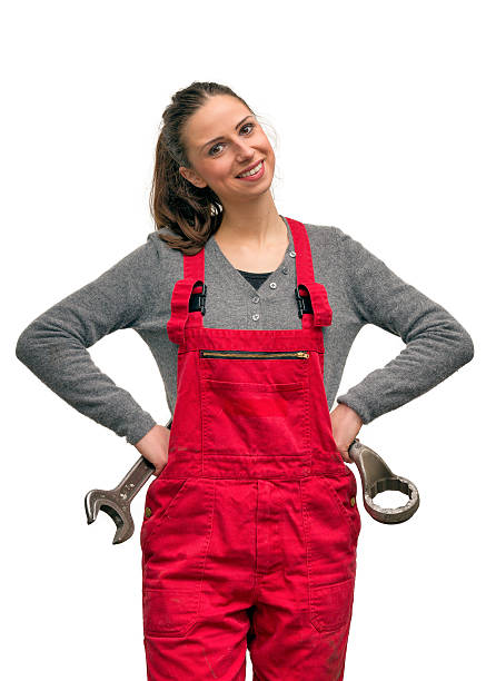 jeune travailleur avec clé - adjustable wrench wrench clipping path red photos et images de collection