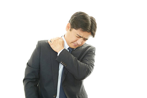istock Businessman with shoulder pain. 461771627