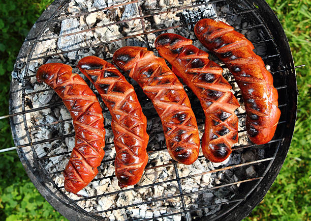 istock Grilling Sausages on barbecue grill 461772319