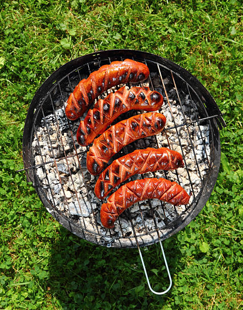 istock Grilling Sausages on barbecue grill 461776369