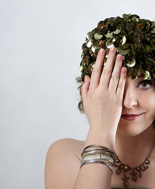 istock Young woman wearing vintage green hat. 461776455