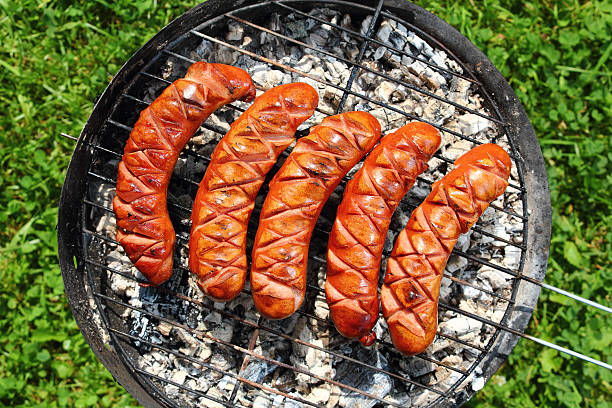 istock Grilling Sausages on barbecue grill 461776649