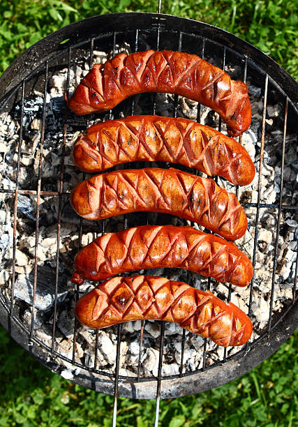 istock Grilling Sausages on barbecue grill 461776653