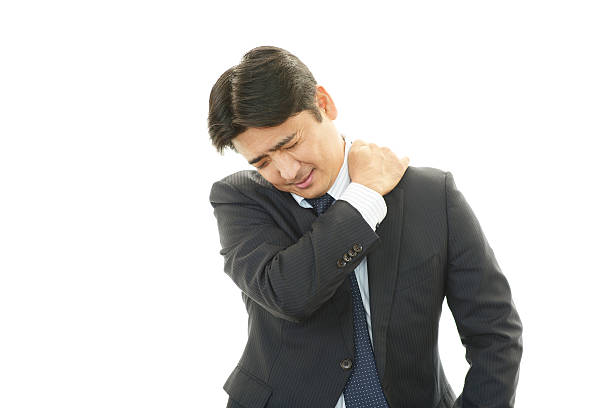 istock Businessman with shoulder pain. 461778143
