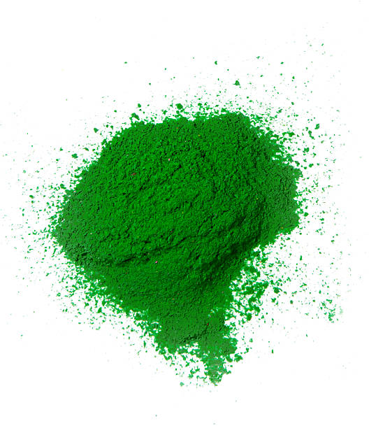 istock Colorful green powder isolated against white background 461783647